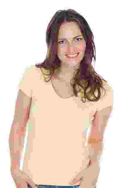 Smiling woman with long hair wearing a light-colored shirt. Smiling woman with long hair wearing a light-colored shirt.