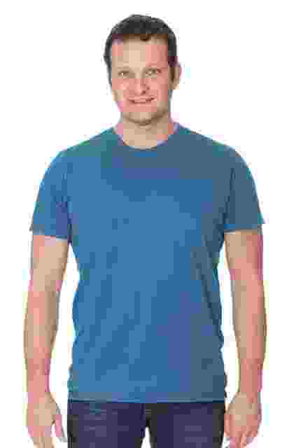 Smiling man wearing a plain blue t-shirt. Smiling man wearing a plain blue t-shirt.
