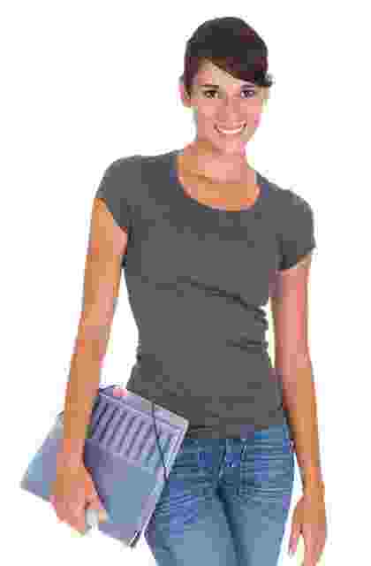 A smiling woman holding a purple clutch purse. A smiling woman holding a purple clutch purse.