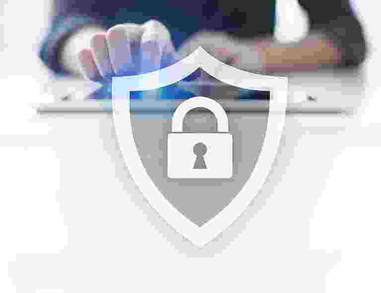 A hand interacting with a digital lock icon symbolizing cybersecurity. A hand interacting with a digital lock icon symbolizing cybersecurity.