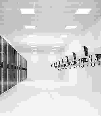 Modern data center aisle with server racks and cooling fans. Modern data center aisle with server racks and cooling fans.