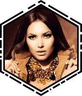 Fashion portrait of a woman with bold makeup and statement jewelry.
