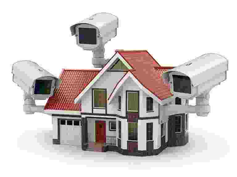 A house surrounded by multiple surveillance cameras symbolizing home security. A house surrounded by multiple surveillance cameras symbolizing home security.