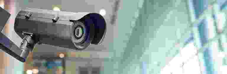 Close-up of a camera lens with a blurry background. Close-up of a camera lens with a blurry background.