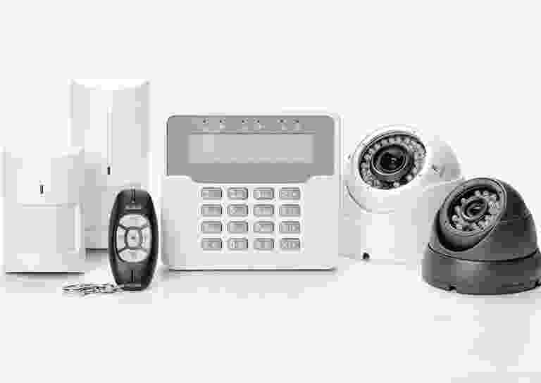 Home security system with keypad, cameras, and remote control. Home security system with keypad, cameras, and remote control.